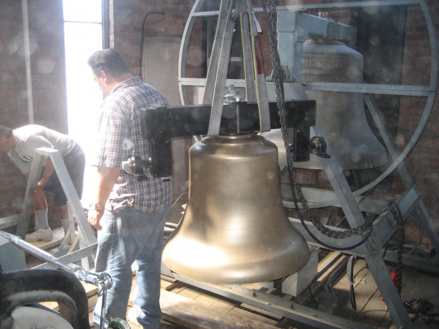 New 800 lb. Bronze Bell being lifted into position at St. John The Evangelist Church