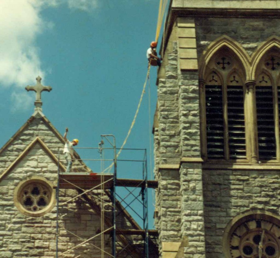 Steeplejacks performing masonry repairs